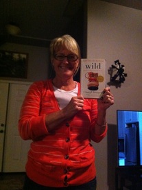 Mrs. Euker holding a copy of Wild
